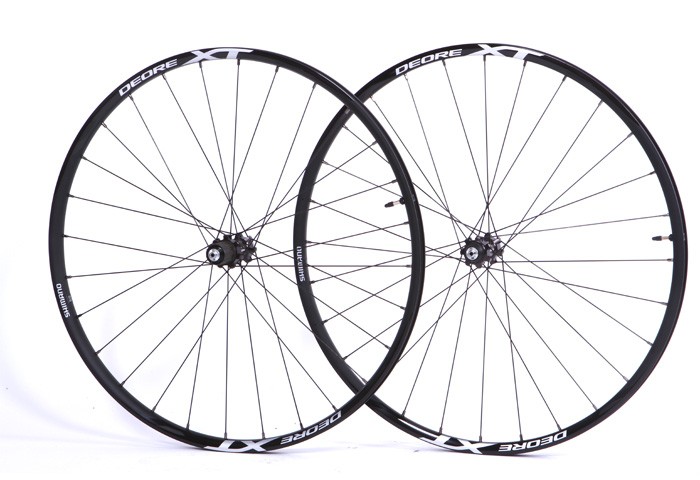 RUEDA 29'' 100MM 142MM ALUMINIO SHIMANO DEORE XT 28A PAR A DISCO